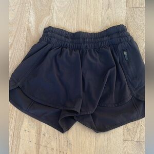 Lulu lemon black shorts with zipper. 4 inch inseam size 6
